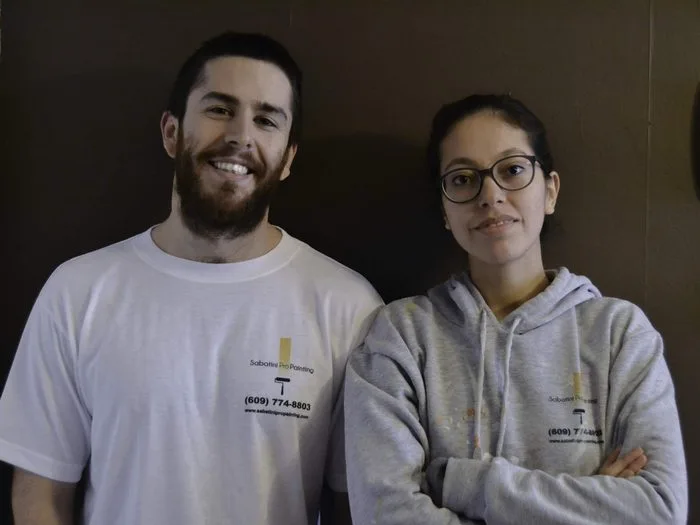 Rick and Alejandra Sabatini in their early Sabatini Pro Painting shirts