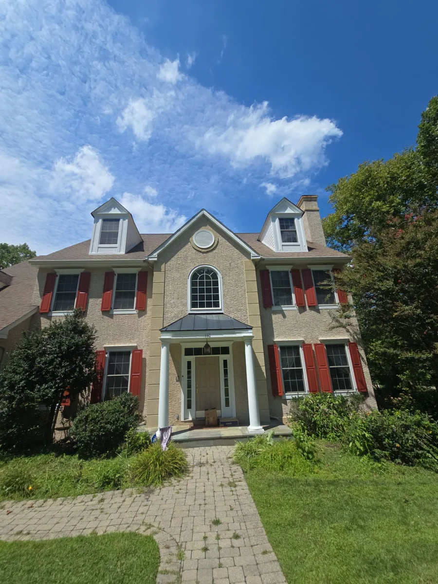 A repainted exterior in Bryn Mawr, PA with fresh siding and trim